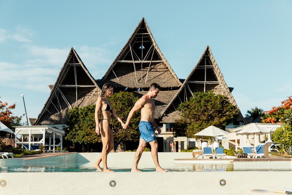 Relax at the full-service spa, where you can enjoy massages, body treatments, and facials. If you're looking for recreational opportunities, you'll find an outdoor pool, a sauna, and a fitness center. This hotel also features complimentary wireless internet access, concierge services, and babysitting (surcharge). The complimentary beach shuttle makes getting to the surf and sand a breeze. Make yourself at home in one of the 40 individually decorated guestrooms, featuring minibars and LCD televisions. Rooms have private furnished balconies or patios. Satellite programming and DVD players are provided for your entertainment, while complimentary wireless internet access keeps you connected. Bathrooms feature showers with rainfall showerheads and designer toiletries.